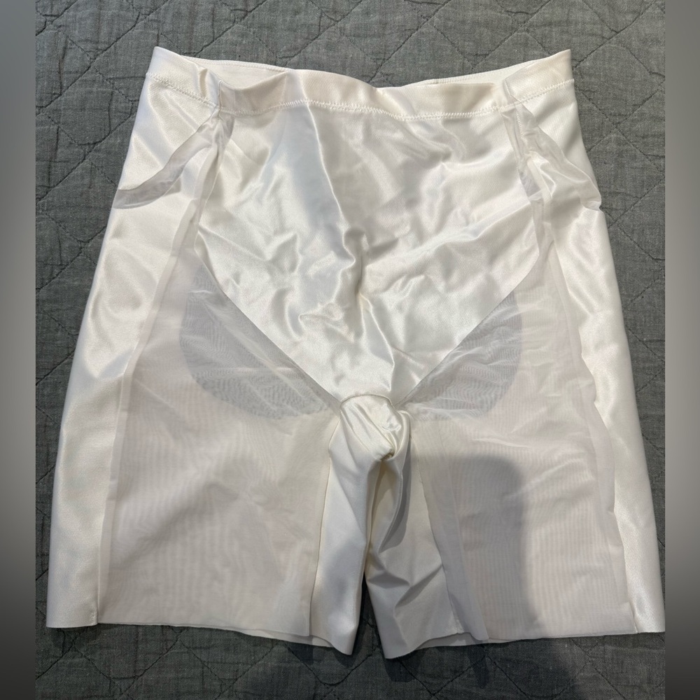 SPANX white booty lifting mid-thigh shorts